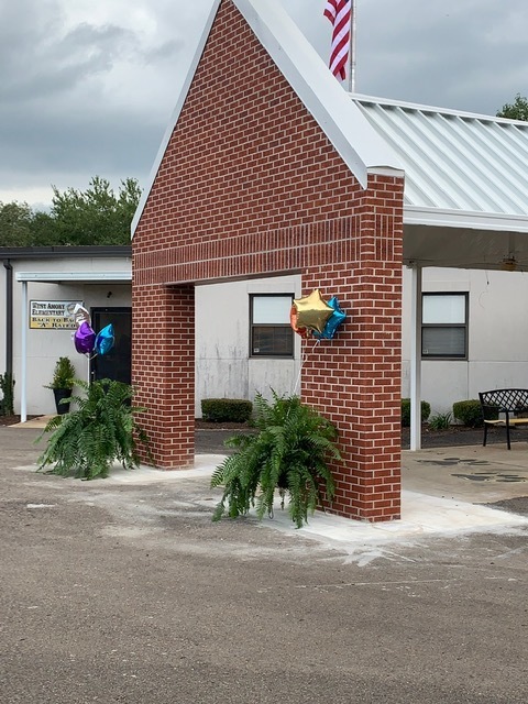 Front of the school building with balloons